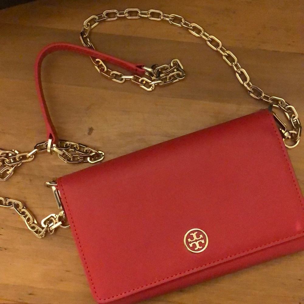 Tory Burch clutch with “gold” chain, carried once. LIKE NEW!